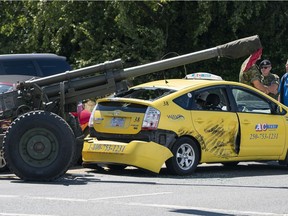 NANAIMO,BC:JULY 21, 2018 -- A Canadian Forces Artillery Gun come to rest in an intersection after is broken away from a truck and collided with a taxi in Nanaimo, BC, July, 21, 2018. (Richard Lam/PNG) () [PNG Merlin Archive]