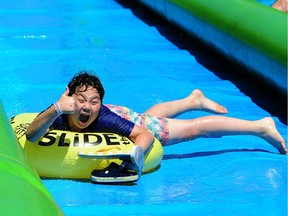 The fourth annual Slide the City event drew 6,000 participants to Lonsdale Avenue North Vancouver this weekend.