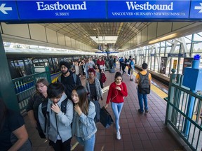 Passengers at Surrey Central Skytrain station.