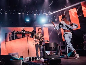 Actors K.J. Apa and Ashleigh Murray of the hit show Riverdale are pictured performing alongside Kygo at Surrey's FVDED in the Park festival on Saturday, July 7, 2018 in this photo from Murray's Instagram account.