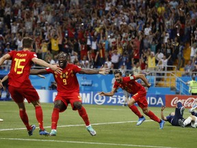 Belgium's Nacer Chadli, second right, celebrates after scoring his third side's goal during the round of 16 match between Belgium and Japan at the 2018 soccer World Cup in the Rostov Arena, in Rostov-on-Don, Russia, Monday, July 2, 2018.