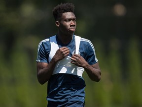Vancouver Whitecaps midfielder Alphonso Davies leaves the field after MLS soccer team practice in Vancouver on Monday, July 23, 2018.