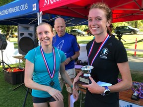 Stephie Pennycook of Edinburgh, Scotland, right, paid a visit to Vancouver and the Summerfast 10K winner's circle both on the same day, winning the women's division of Saturday's race at Stanley Park in a time of 34:27.