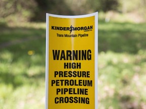 A sign where buried pipelines are located is seen in Burnaby B.C.