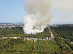 A wildfire burning near the Westminster Highway on Department of Defence land in Richmond on Friday July 27, 2018.