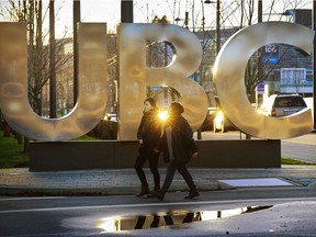 U.B.C. glows in the late evening light in February 2016 while students walk in around the campus at B.C.'s largest university. (Mark van Manen/PNG FILES)