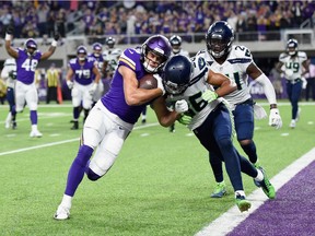Akeem King #36 of the Seattle Seahawks attempts to block Jake Wieneke #9 of the Minnesota Vikings on his way to score a two-point conversion during the fourth quarter in the preseason game on August 24, 2018 at US Bank Stadium in Minneapolis, Minnesota. The Vikings defeated the Seahawks 21-20.