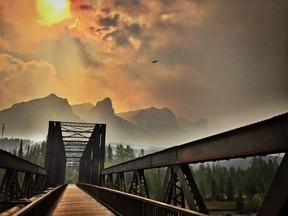 Smoke from the wildfires in B.C. blows into Canmore and fills the air over the Engine Bridge on Wednesday, August 1, 2018. Photo by Pam Doyle/www.pamdoylephoto.com