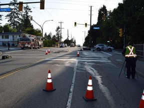 Coquitlam RCMP investigate a motorcycle crash on Como Lake Avenue on Wednesday. [PNG Merlin Archive]