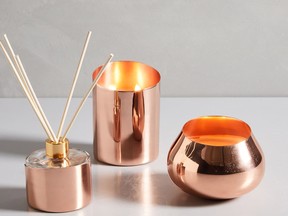 Copper candles and diffuser  available at West Elm.
