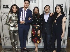 In this Aug. 14, 2018, file photo, Actors Michelle Yeoh, from left, Henry Golding, Constance Wu, Ken Jeong and Awkwafina participate in the BUILD Speaker Series to discuss the film "Crazy Rich Asians" at AOL Studios in New York.