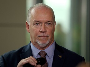 'We’re doing our level best to meet public need but also assure the public that cannabis distribution is not going to be on every street corner,' says Premier John Horgan. 'We’re going to protect kids.'