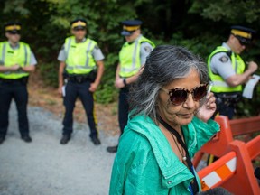 Tsastilqualus speaks to media after being arrested by Burnaby RCMP during the dismantling of Camp Cloud near the entrance of the Kinder Morgan Trans Mountain pipeline facility in Burnaby, B.C., on Thursday August 16, 2018.