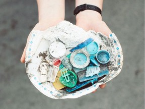 An assortment of debris found on the shoreline of Haida Gwaii, B.C., is shown in this undated handout photo. A study analyzing data from volunteer shoreline cleanups in British Columbia says cigarettes and filters from them account for almost 50 per cent of the waste collected in Vancouver and Victoria. University of British Columbia researchers say the findings could help guide future waste management strategies, especially when it comes to reducing plastic pollution.