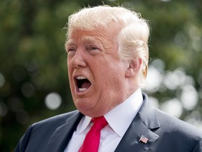 Canada's forestry industry is pushing back against comments by U.S. President Trump that lumber imports are partially to blame for intense forest fires in California. President Donald Trump speaks to members of the media before boarding Marine One on the South Lawn at the White House in Washington, Friday, Aug. 17, 2018, for a short trip to Andrews Air Force Base, Md., and then on to Southampton, N.Y., for a fundraiser.