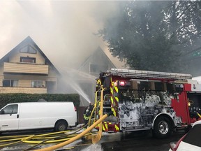 Vancouver Fire and Rescue posted this photo on social media of a house on fire Thursday on West 3rd in Vancouver's Kitsilano neighbourhood.