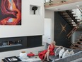 Interior designer Trisha Isabey at home in her contemporary masterpiece. [PNG Merlin Archive]