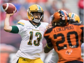 Edmonton Eskimos quarterback Mike Reilly passes during first half CFL football action against the B.C. Lions, in Vancouver on Thursday, August 9, 2018.