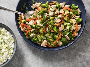 This recipe for stir-fried chicken and broccoli with herbs and scallion rice appears in the cookbook Dinner Illustrated.