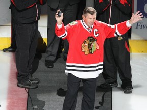 Former Chicago Blackhawks player Stan Mikita waves to the crowd prior to the start of play against the Calgary Flames during Game Five of the Western Conference Quarterfinals of the 2009 Stanley Cup Playoffs on April 25, 2009 at the United Center in Chicago, Illinois. (Jonathan Daniel/Getty Images)