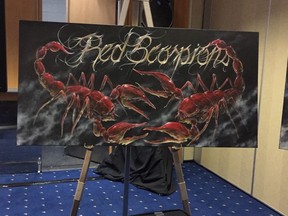 A Red Scorpions gang-related painting, part of the items seized by police and displayed at a news conference on Friday. (Photo: Kim Bolan)