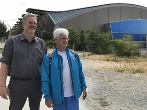 Warren Purchase, events program manager at Richmond Olympic Oval, and Forever Young 8K founder John Young, right, met Thursday morning to go over the out-and-back race course and logistics for the fourth annual seniors' spectacle that's set for Sept. 9 in Richmond.