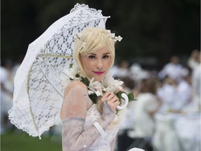 Striking a pose at the 2018 Dîner en Blanc in the VanDusen Botanical Garden.