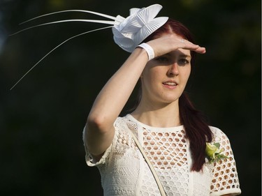 Jayme Dunn looks for her spot at the 7th Annual Le Dîner en Blanc at the VanDusen Botanical Garden in Vancouver on Thursday.