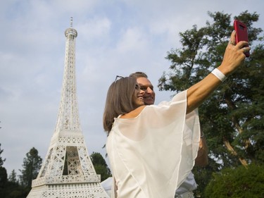 A couple take a selfie at the 7th Annual Le Dîner en Blanc at the VanDusen Botanical Garden in Vancouver on Thursday.