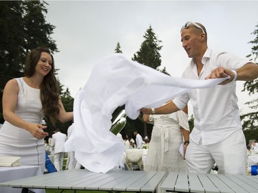 Attendees at the 7th Annual Le Dîner en Blanc  at the VanDusen Botanical Garden in Vancouver on Thursday.