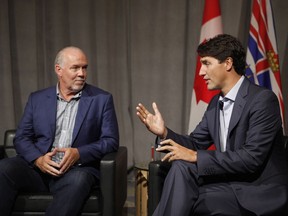 Prime Minister Justin Trudeau met with B.C. Premier John Horgan at the Vancouver Island Conference Centre during the Liberal cabinet retreat in Nanaimo, B.C., on Tuesday, August 21, 2018.