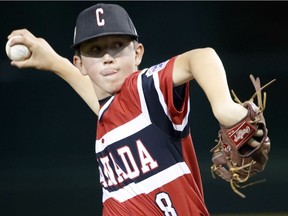 Canada's Cole Balkovec delivers a pitch against Panama during the fifth inning of Whalley Allstars' opening game of the Little League World Series in Williamsport, Pa. Canada lost 8-3 to Panama.