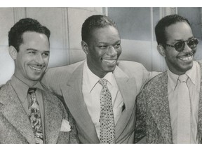 The King Cole Trio in Vancouver, Aug. 31, 1948. Left to right: Joe Comfort (bass), Nat "King" Cole (piano) and Irving Ashby (guitar).