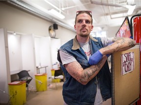 Trey Helten poses for a photograph while working at a safe consumption site at the Overdose Prevention Society in the Downtown Eastside of Vancouver on Friday, August 10, 2018. Helten has known almost every one of the 50 or so people he has treated for overdoses on Vancouver's Downtown Eastside since February. As a former heroin and methamphetamine user who lived in the neighbourhood for three years before getting clean and returning "to do something positive," he's one of many peer support volunteers and workers playing a vital role in stemming the overdose crisis that has devastated the province.