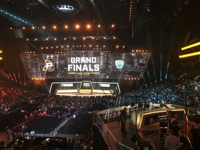 In this July 27, 2018 photo, fans fill the arena as the stage is set for the Overwatch League Grand Finals' first night of competition, at the Barclays Center in the Brooklyn borough of New York.