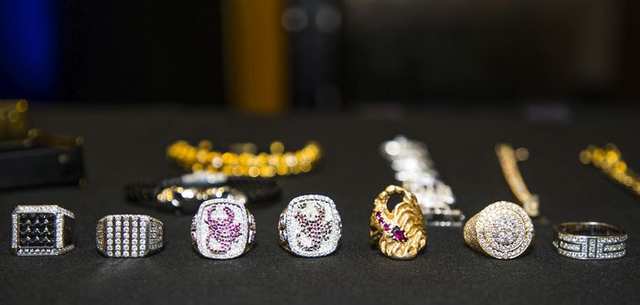 Some jewelry, part of the items seized by police and displayed at a news conference on Friday in Vancouver that announced the arrest of 14 gangsters who face 93 charges. (Photo: Francis Georgian, PNG)