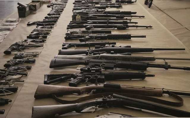 Some of the firearms seized by police and displayed at a news conference on Friday in Vancouver that announced the arrest of 14 gangsters who face 93 charges. (Photo: Francis Georgian, PNG)