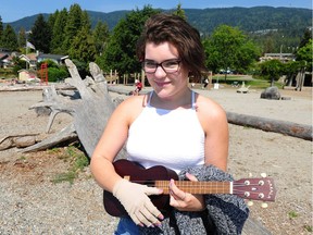 Sammy Badger, who goes by the stage name Valor Grey, with her Ukulele in Dundarave Park in West Vancouver on Aug. 28.