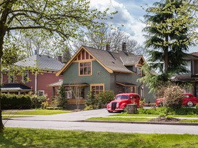 New Westminster's Queen's Park neighbourhood is known for  grand historic homes that date back to the 19th century and their lushly beautiful gardens. [PNG Merlin Archive]