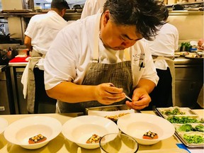 Chef Ryan McCaskey of 2-michelin star Acadia in Chicago cooking at Botanist at Fairmont Pacific Rim in Vancouver, part of Michelin on the Road series.