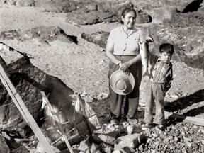 Fishing for sockeye salmon in 1958 where the Bridge River joins the Fraser north of Lillooet, Catherine Frank minded Arnie Narcisse who would grow up to chair the B.C. Aboriginal Fisheries Commission.