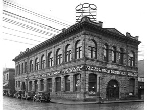 1931 Stuart Thomson photo of Wrigley Directories Limited on the corner of Pender Street and Hamilton Street. Stuart Thomson/Vancouver Archives CVA 99-4107.