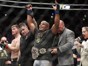 Yes, freestyle wrestling and mixed martial arts are related, but what Daniel Cormier has done in being the second of two fighters in UFC history to hold titles in two weight classes simultaneously is still staggering.