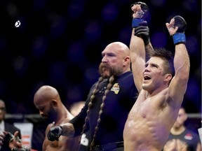 Henry Cejudo celebrates his UFC Flyweight Title Bout win over Demetrious Johnson during UFC 227 at Staples Center on August 4, 2018 in Los Angeles, United States.