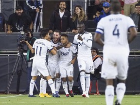 Vancouver Whitecaps midfielder Cristian Techera (13) celebrates with teammates after scoring a goal against the San Jose Earthquakes during the second half at Avaya Stadium Saturday night.