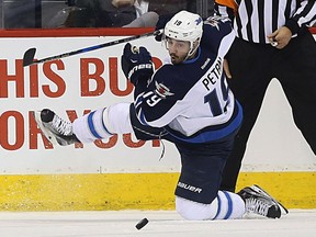 Winnipeg Jets forward Nic Petan loses his footing during a power play against the Anaheim Ducks in Winnipeg on Thurs., March 30, 2017. Kevin King/Winnipeg Sun/Postmedia Network ORG XMIT: POS1703302017264294 ORG XMIT: POS1703302055304512