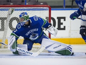 Vancouver Canucks' goaltender Michael DiPietro makes a save against the Winnipeg Jets during the Young Stars Classic on Friday night at the South Okanagan Events Centre in Penticton.