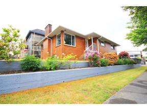 This home at 2695 East 53rd Avenue in Vancouver sold for $1,650,000. For Sold (Bought) in Westcoast Homes. [PNG Merlin Archive]