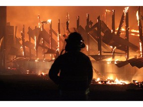 A massive fire at a dairy farm in Agassiz Wednesday night destroyed multiple buildings.