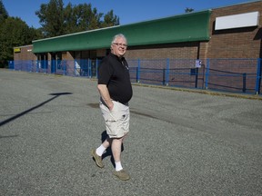 Former Langley Mayor Rick Green walks through the parking lot of the closed down and fenced off Aldergrove Mall.